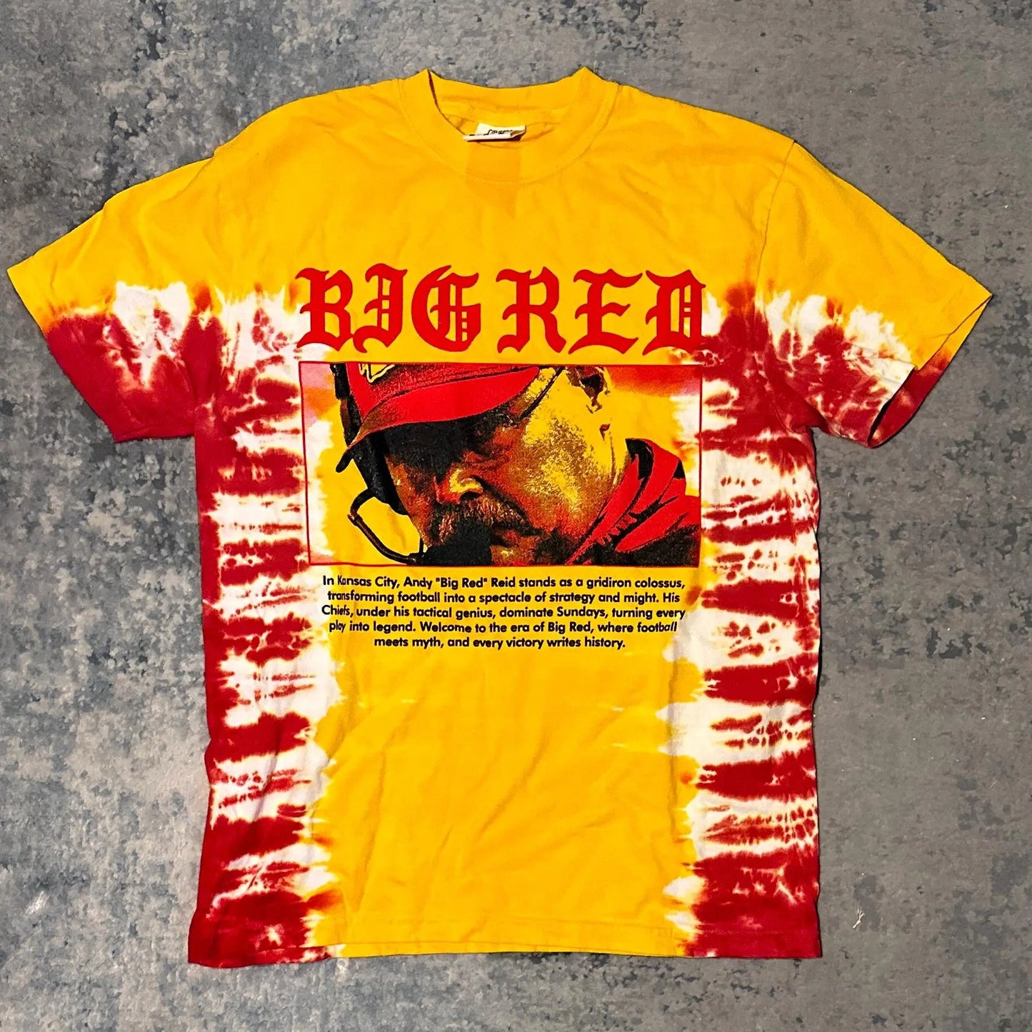 Red and gold tie-dye t-shirt with featuring Andy Ried graphic and a legendary description by Always Outside