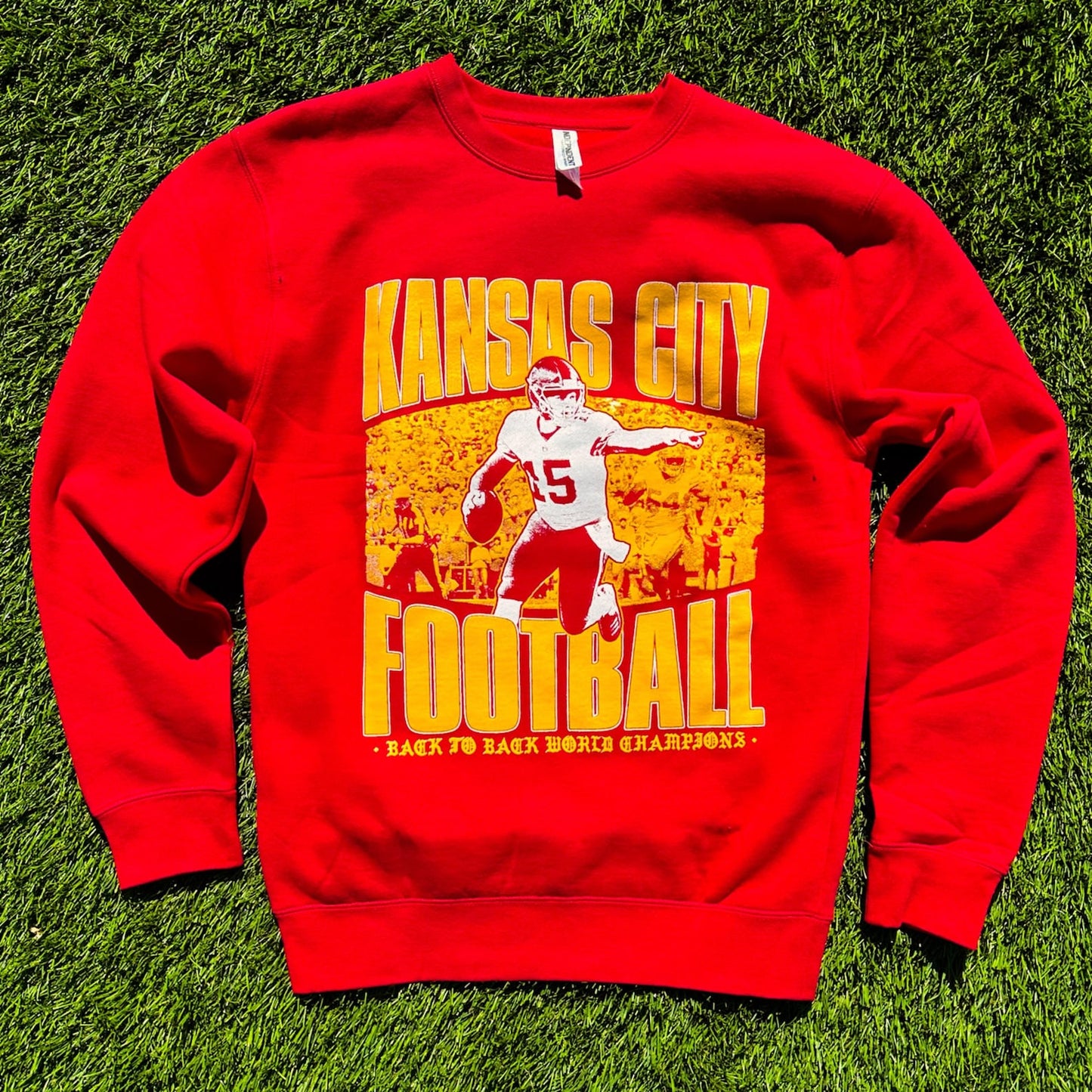 Red sweatshirt with 'The Arrowhead Assassin' Patrick Mahomes screen-printed graphic by Always Outside