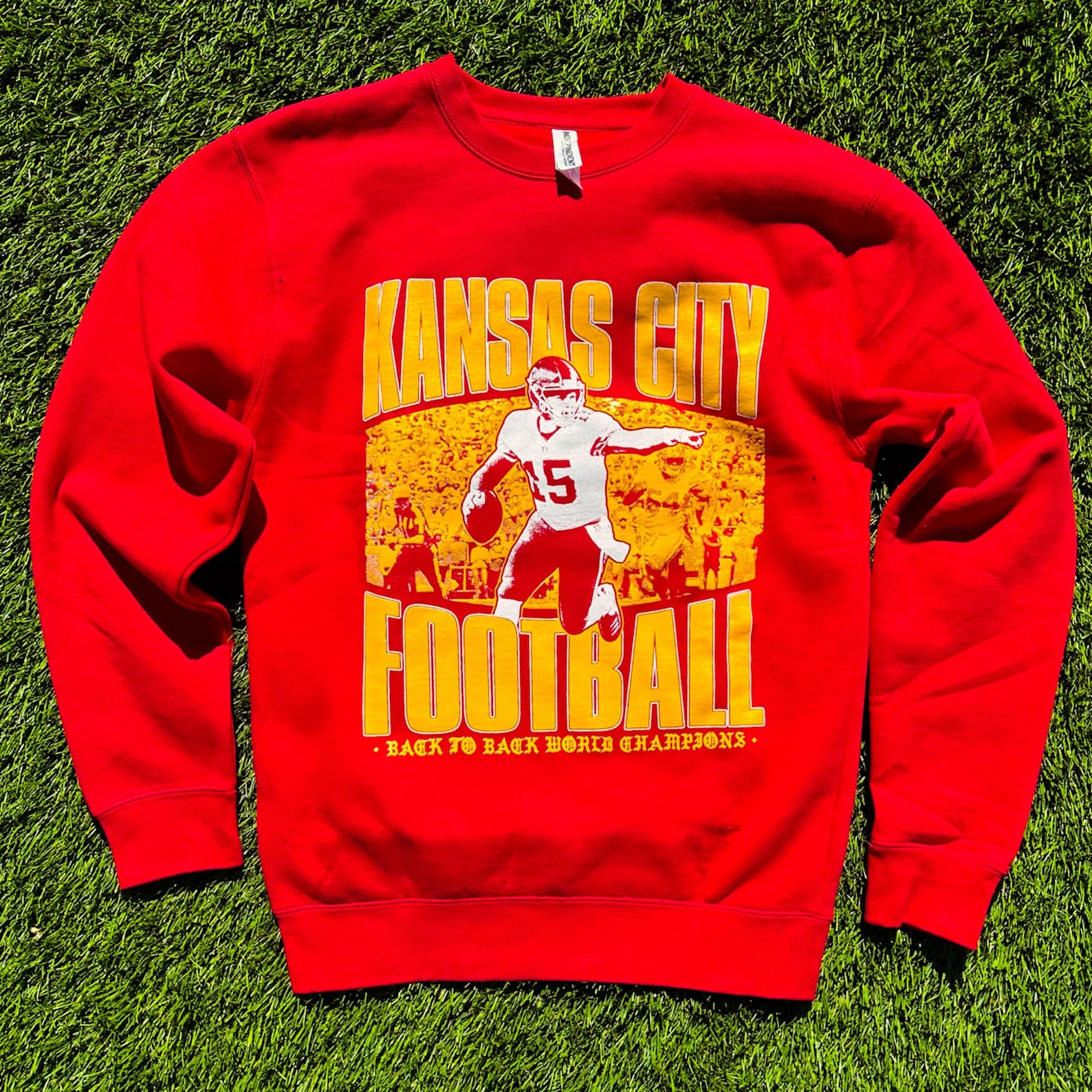 Red sweatshirt with 'The Arrowhead Assassin' Patrick Mahomes screen-printed graphic by Always Outside