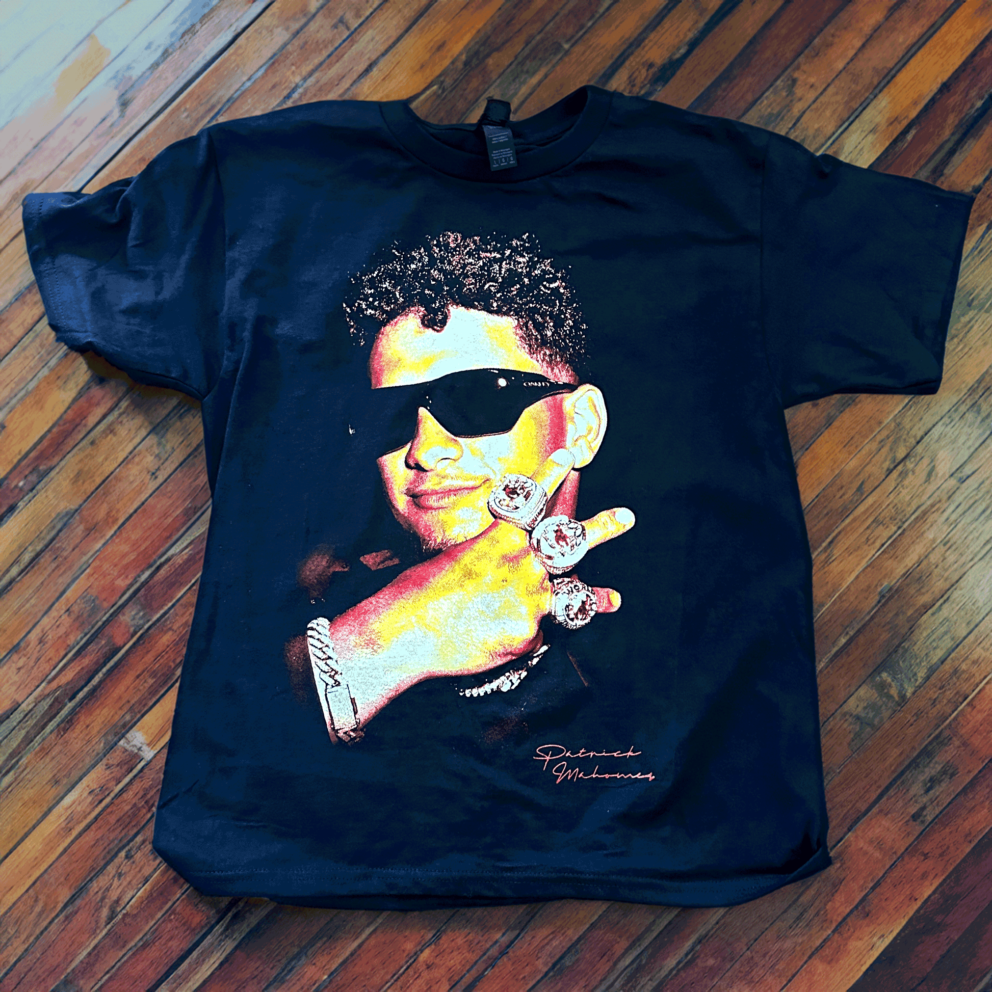 Black youth t-shirt with Patrick Mahomes and his three rings screen-printed graphic by Always Outside